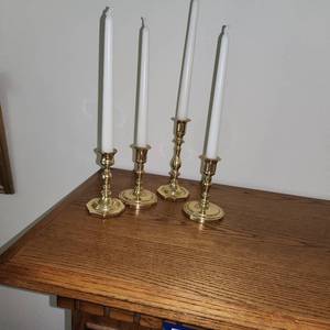 Brass-Like Candlesticks Measuring 5 Inches To 7.5 Inches Tall