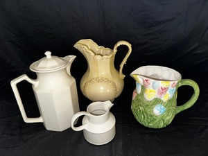 Four Water Pitchers