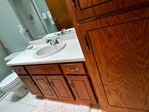 Bathroom Cabinets, Countertops, Sink and Faucet Buyer To Remove. Measures 48 Inches For The Base x  24 Inches For The Linen Closet