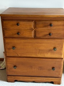 Three Drawer DresserDesk with pullout secretary desk - contents not included. Measuring 32 inches wide x 19 inches deep x 38 inches tall