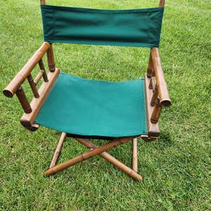 lot 11 image: Vintage Wood And Green Canvas Folding Directors Chair With Bamboo Styled Legs Measuring 23 Inches By 16 Inches By 32 Inches