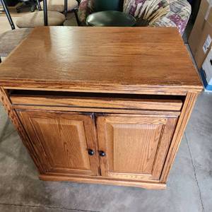 lot 17 image: Solid Wood Cabinet With Rollout Tray Measuring 30 Inches Wide 20 12 Inches Deep And 30 Inches Tall