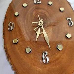 lot 23 image: Vintage Wood Wall Clock Measuring 15 Inches By 10 Inches