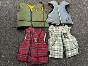 lot 56 image: Four Vintage Stern Lifejackets
