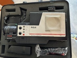 lot 91 image: Vintage RCA VHS Recorder With Auto Focus And Solid State Image Sensor In Case