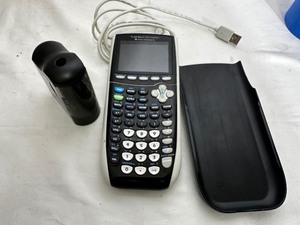 lot 161 image: TI-84 Plus Graphing Calculator and Pencil Sharpener