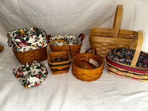 lot 227 image: Variety of Longaberger Baskets and Floral Liners as seen in photo