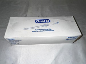 lot 244 image: Box of 36 Oral-B Interdental Brush Wand HandelClip Sealed