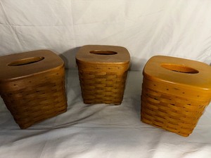 lot 204 image: Three Square Tissue Box Longaberger Baskets all with Wood Covers