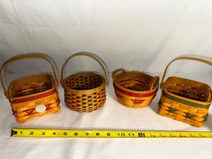 lot 205 image: Four Smaller Vintage Holiday Longaberger Baskets