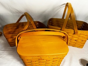 lot 212 image: Three Vintage Longaberger Baskets all with Wood Handles