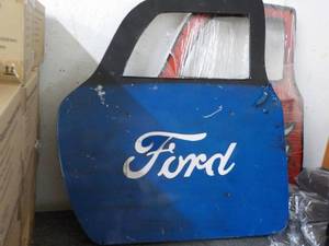 lot 31 image: Metal Ford Door Dcor 35 x 36...
