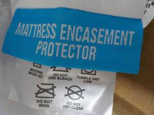 lot 84 image: King Size Mattress Protector...