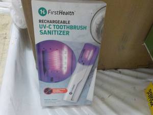 lot 97 image: First Health Rechargeable Toothbrush Sanitizer