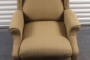 Elegant Wingback Armchair with Patterned Upholstery
