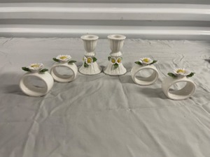 Four Ceramic Napkin Rings and Two Candlesticks