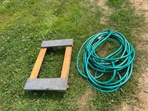 lot 52 image: Garden Hose & Furniture Mover