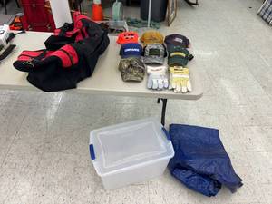 lot 145 image: Gloves, Caps, Bag & Tarp in Tote