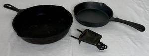 lot 110 image: Cast Iron Skillets and Vintage Miniature Cast Iron Wheelbarrow