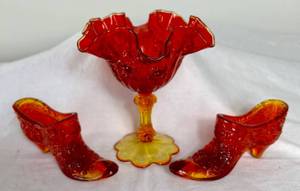 lot 136 image: Fenton Amberina Ruffled Edge Compote and Fenton Amberina Glass Shoes