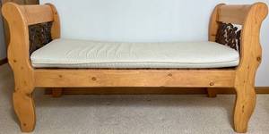 lot 55 image: Wooden Footboard Bench with Metal Accents and Cushion