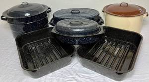 lot 100 image: Vintage Enamelware Two Large Canning Stock Pots one with Rack and 2 Roasting Pans with lids and 2 Roasting Pans without lids