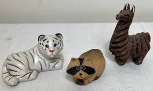 lot 164 image: Artesania Rinconada Collectible Figurines- Raccoon, Llama, and White Tiger