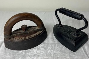 lot 177 image: Cast Iron Geneva IL 8 pound Sad Iron and Antique Wood Stove Iron with Wooden Handle Enterprise MFG CO. Philadelphia