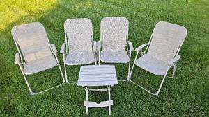 lot 60 image: Four Folding Patio Chairs and One Folding Patio Table