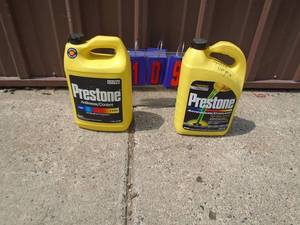 Qty of 2 jugs of antifreeze. One has been opened. As shown.