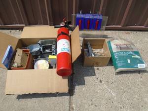 Electrical boxes, fire extinguisher, 3m epoxy & fire pit cover. As shown.