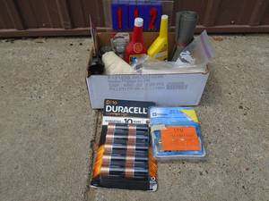 Box od D batteries & wheel locks auto chemicals. As shown.