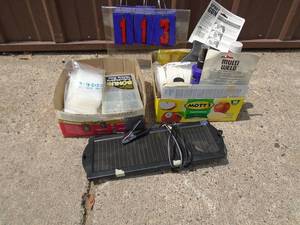 Plastic bags, auto chemicals & working solar panel. As shown.