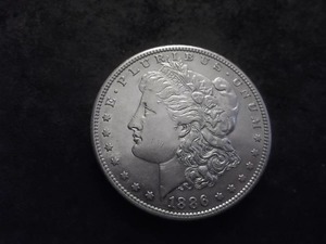 lot 16 image: 1886 S Morgan Silver Dollar