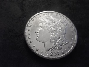 lot 18 image: 1887 S Morgan Silver Dollar