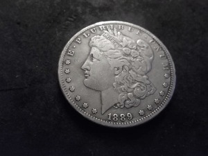 lot 20 image: 1889  CC Morgan Silver Dollar