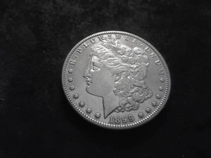 lot 28 image: 1899 S Morgan Silver Dollar