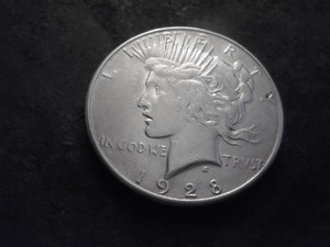 lot 36 image: 1928 S Peace Silver Dollar
