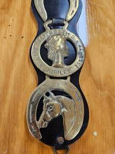 lot 210 image: Elizabeth Silver Jubilee Souvenir Saddle Badges