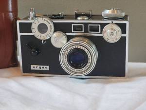 lot 34 image: Vintage Argus Film Camera with Leather Case - f3.5 - 55mm