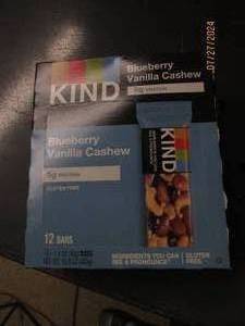 lot 58 image: package of kind blueberry vanilla cashew bars best buy date of march 2025