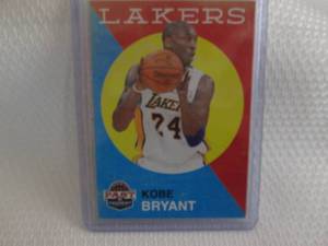 lot 30 image: 2011-12 Panini Kobe Bryant Card...