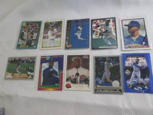 lot 124 image: Assorted Ken Griffey JR Cards...