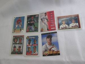 lot 141 image: 7 Chipper Jones Rookie Cards...