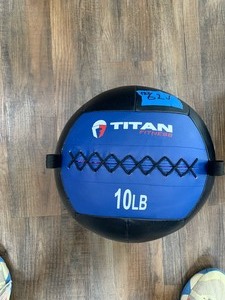 lot 62 image: Titan Medicine Balls 10 LB and 14 LB