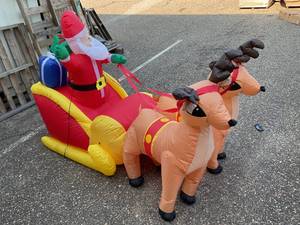 lot 324 image: Tangkula 7.5 FT Christmas Inflatable Lighted Santa Claus on Sleigh with Reindeers & Gift Boxes