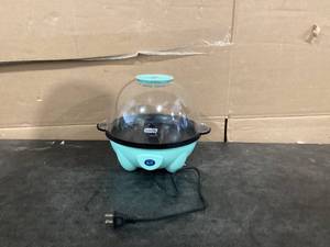 lot 530 image: Dash 4.5 Qt. Stirring Electric Popcorn Popper with Lid for Serving Bowl & Convenient Storage, 18 Cups