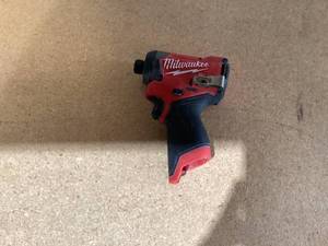 lot 578 image: Milwaukee M12 FUEL 14 Cordless Brushless Impact Driver Tool