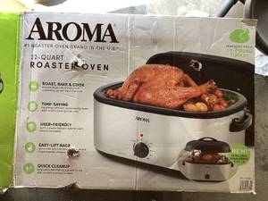 lot 403 image: Aroma 22 Quart Electric Roaster Oven Stainless Steel with Self-Basting Lid