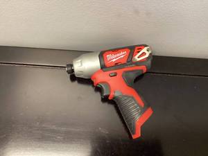 lot 76 image: Milwaukee 2462-20 M12 12V Hex Impact Driver
